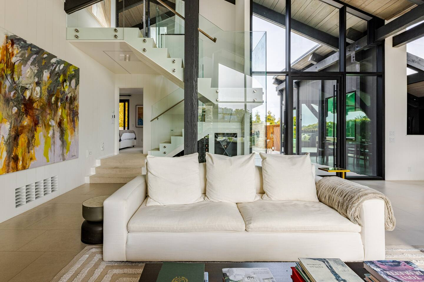 Living room with fireplace and art